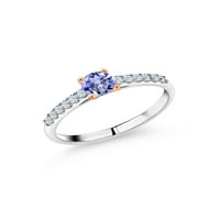 Kralj dragulja 0. Prsten od plavog tanzanita i bijelog safira od bijelog zlata od 10 karata sa zupcima od ružičastog